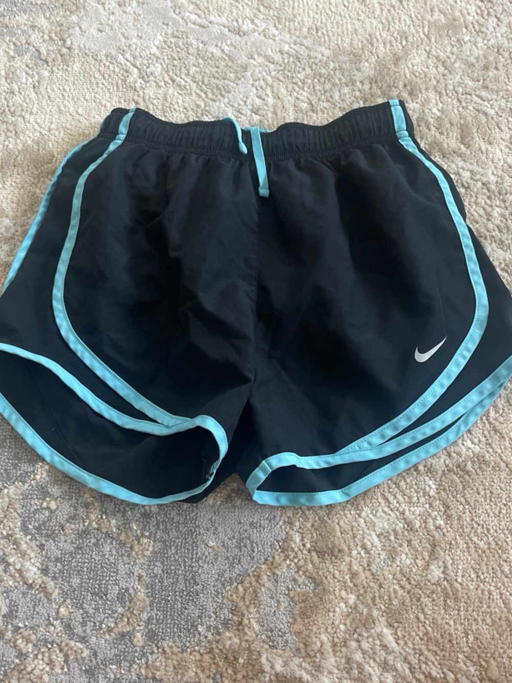 Nike Women's Black Athletic Shorts with Light Blue Trim